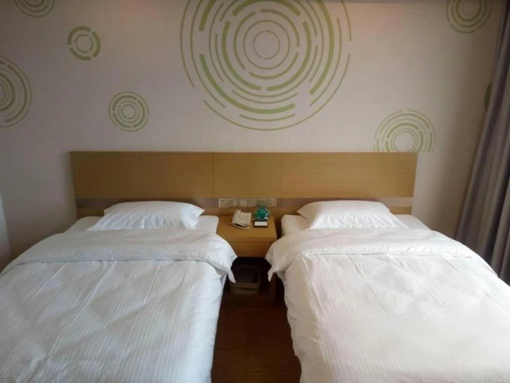 Bed in GreenTree Inn Qingdao Jiaozhou Jiaoping Road Express Hotel