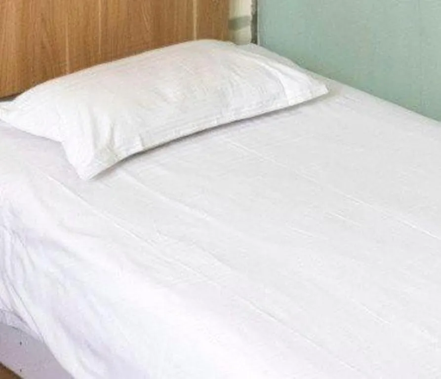 Bed in GreenTree Inn Qingdao Jiaozhou Jiaoping Road Express Hotel