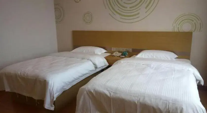 Bed in GreenTree Inn Qingdao Jiaozhou Jiaoping Road Express Hotel Bed in GreenTree Inn Qingdao Jiaozhou Jiaoping Road Express Hotel