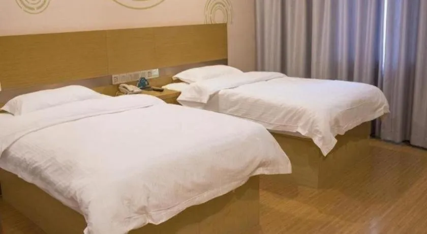 Bed in GreenTree Inn Qingdao Jiaozhou Jiaoping Road Express Hotel