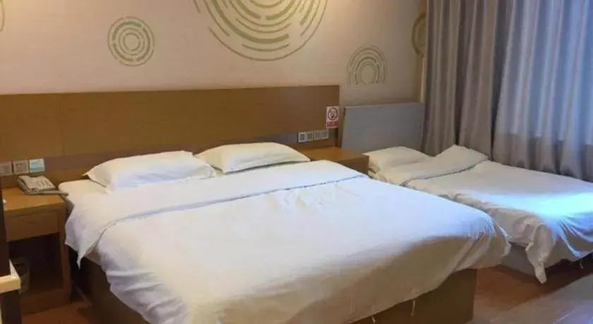 Bed in GreenTree Inn Qingdao Jiaozhou Jiaoping Road Express Hotel Bed in GreenTree Inn Qingdao Jiaozhou Jiaoping Road Express Hotel