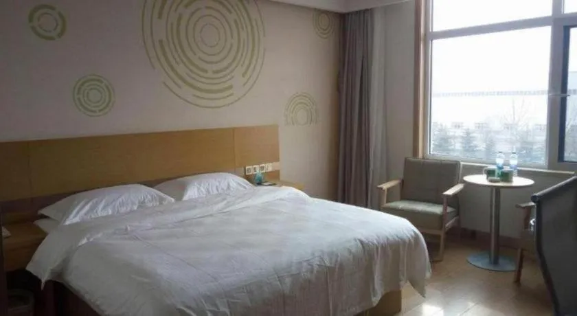 Bed in GreenTree Inn Qingdao Jiaozhou Jiaoping Road Express Hotel