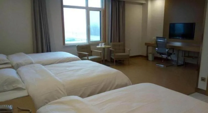 Bed in GreenTree Inn Qingdao Jiaozhou Jiaoping Road Express Hotel