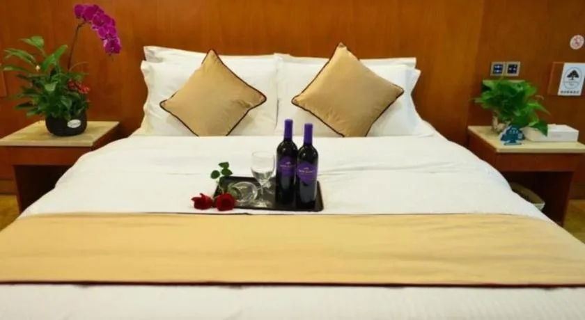 Bed in GreenTree Inn Qingdao Jiaozhou Jiaoping Road Express Hotel