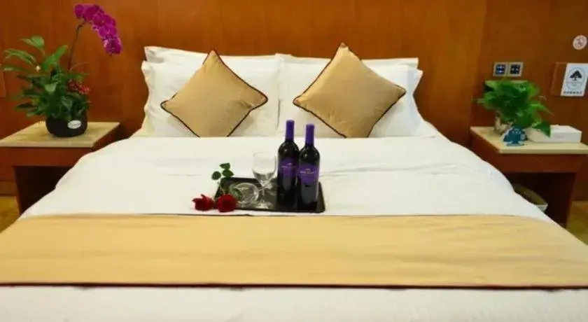 Bed in GreenTree Inn Qingdao Jiaozhou Jiaoping Road Express Hotel Bed in GreenTree Inn Qingdao Jiaozhou Jiaoping Road Express Hotel