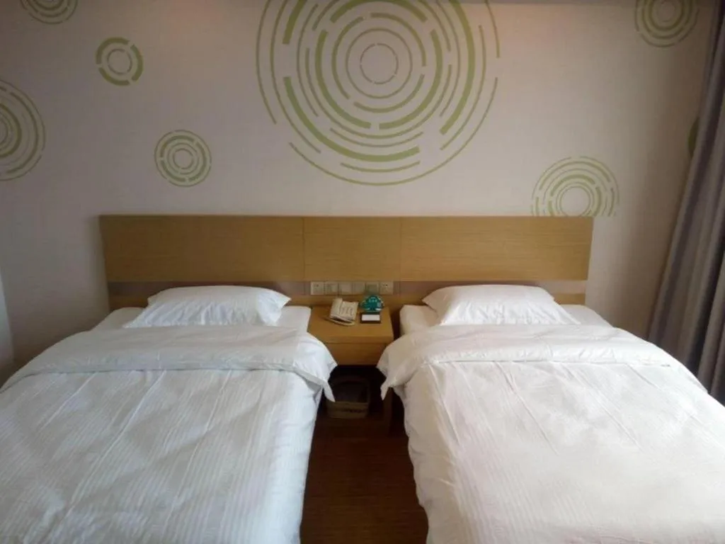 Bed in GreenTree Inn Qingdao Jiaozhou Jiaoping Road Express Hotel