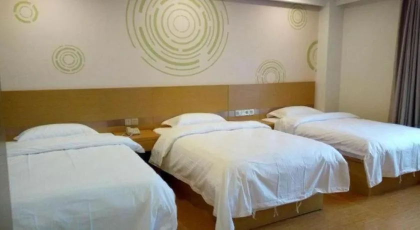 Bed in GreenTree Inn Qingdao Jiaozhou Jiaoping Road Express Hotel