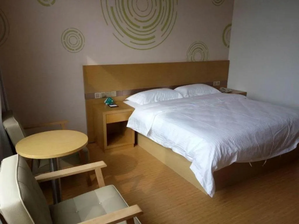 Bed in GreenTree Inn Qingdao Jiaozhou Jiaoping Road Express Hotel