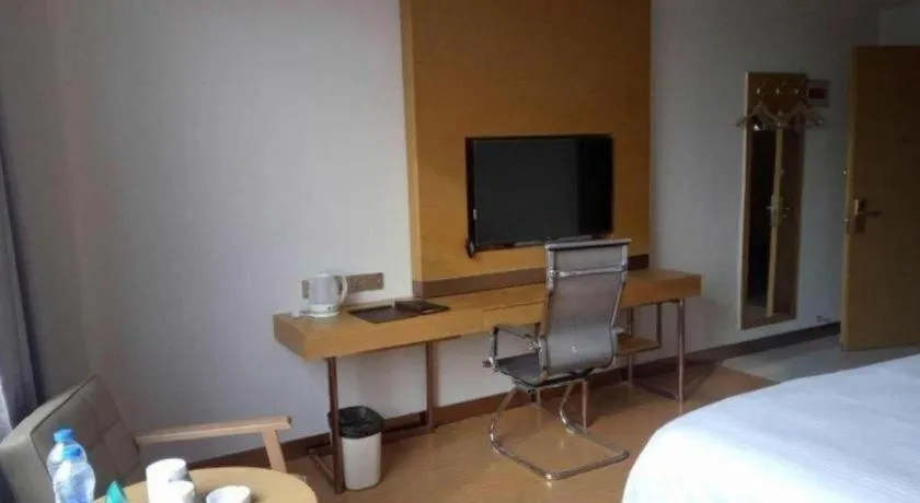 Bed in GreenTree Inn Qingdao Jiaozhou Jiaoping Road Express Hotel