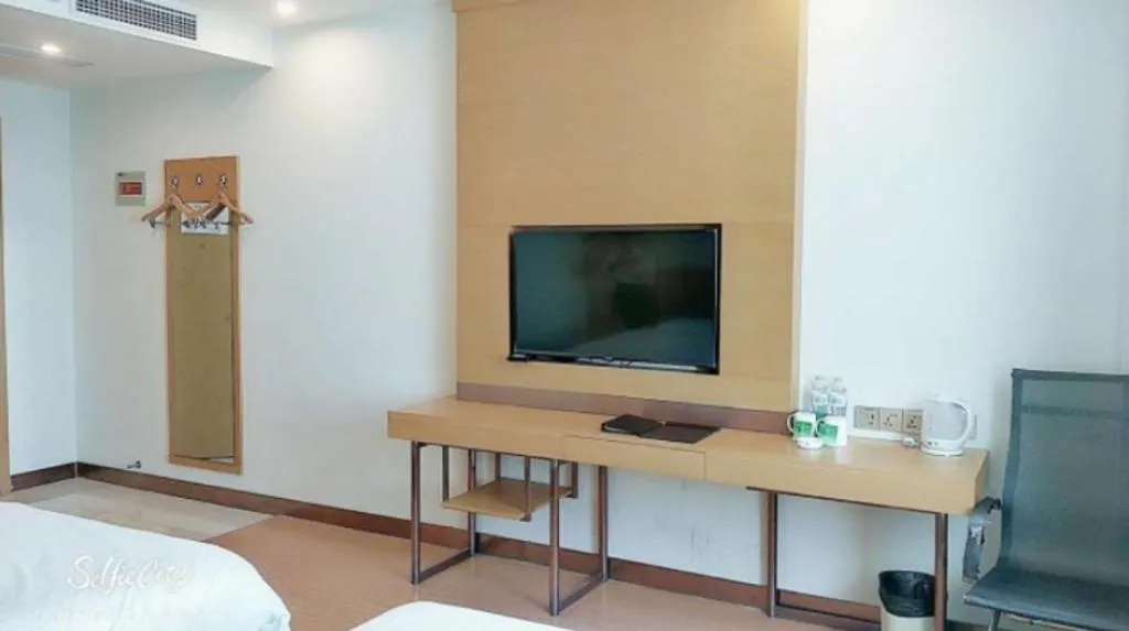 Bed in GreenTree Inn Qingdao Jiaozhou Jiaoping Road Express Hotel