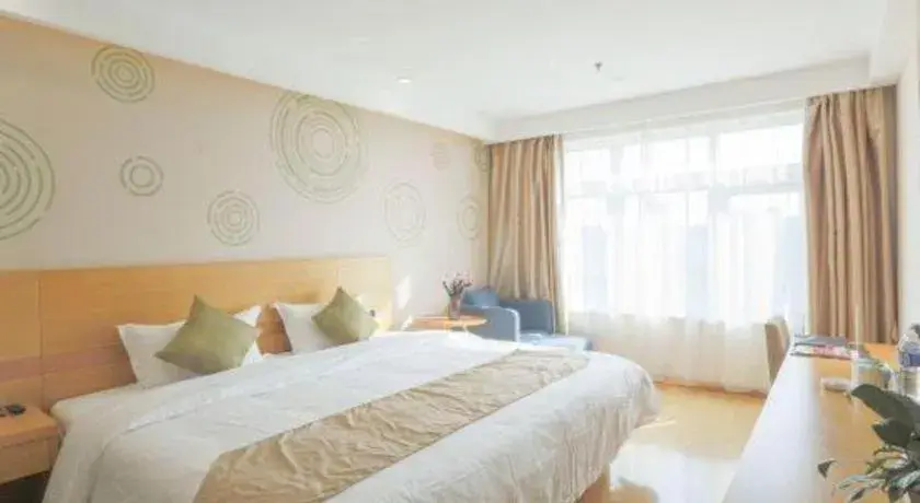 Bed in GreenTree Inn Zhangjiagang Yangshe Old Street Stadium Bed in GreenTree Inn Zhangjiagang Yangshe Old Street Stadium