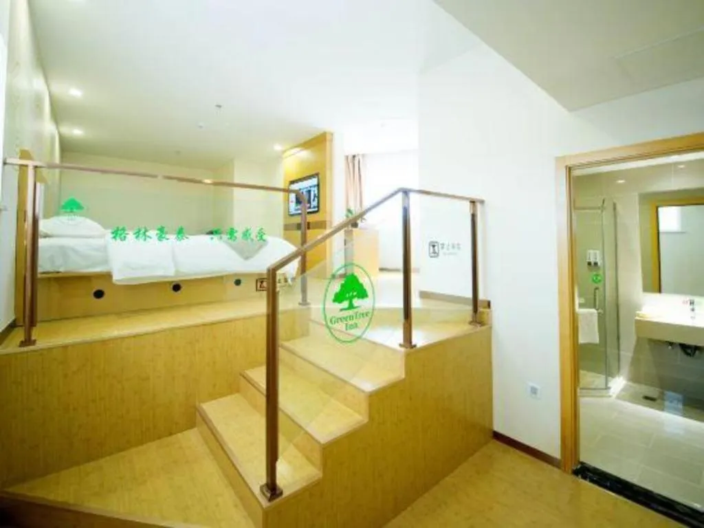 Bed in GreenTree Inn Zhangjiagang Yangshe Old Street Stadium