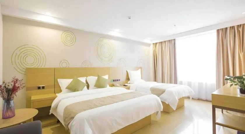 Bed in GreenTree Inn Zhangjiagang Yangshe Old Street Stadium