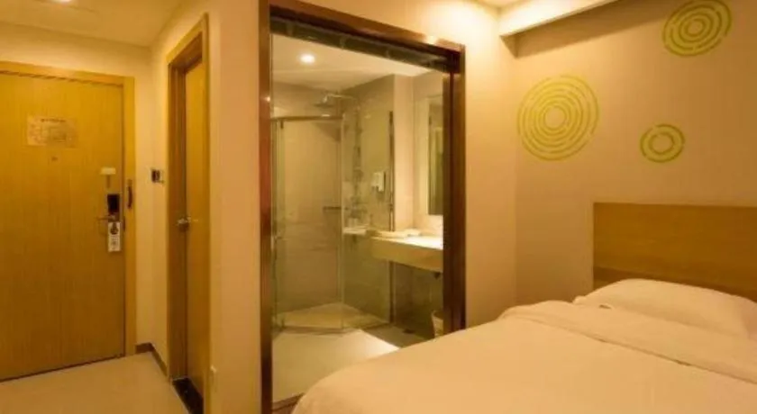 Bed in GreenTree Inn Zhangjiagang Yangshe Old Street Stadium