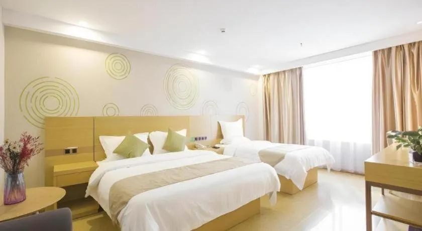 Bed in GreenTree Inn Zhangjiagang Yangshe Old Street Stadium