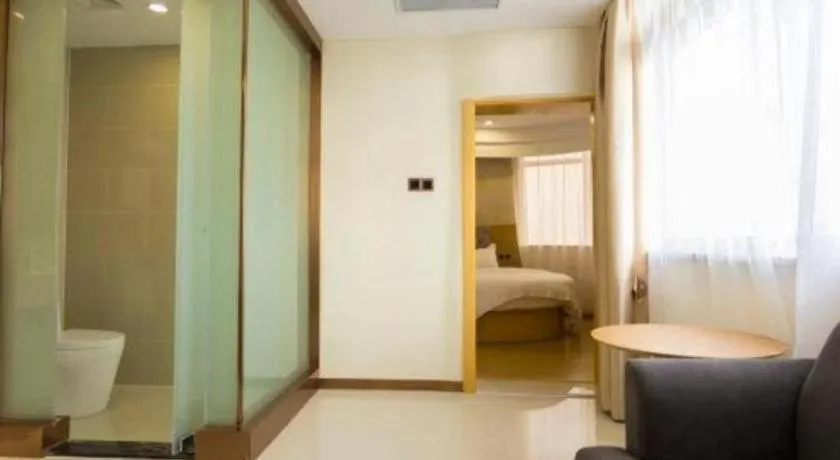 Bed in GreenTree Inn Zhangjiagang Yangshe Old Street Stadium