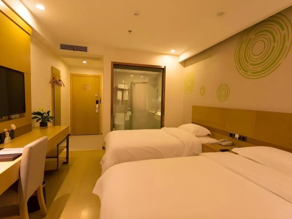 Bed in GreenTree Inn Zhangjiagang Yangshe Old Street Stadium