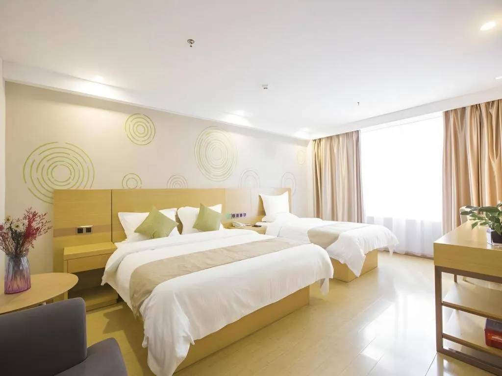 Bed in GreenTree Inn Zhangjiagang Yangshe Old Street Stadium