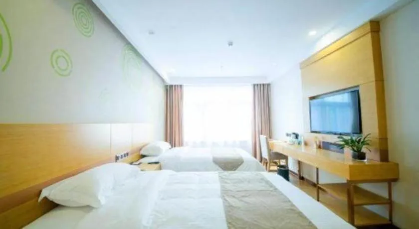 Bed in GreenTree Inn Zhangjiagang Yangshe Old Street Stadium