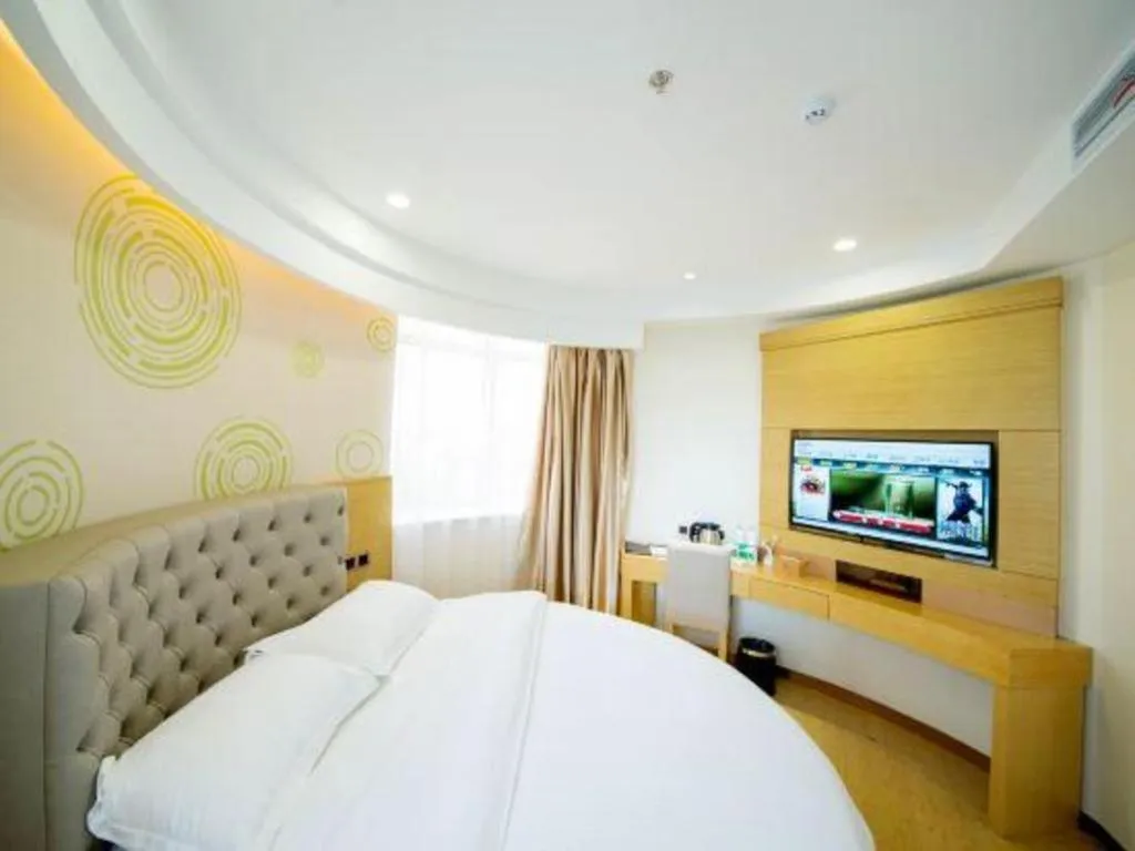 Bed in GreenTree Inn Zhangjiagang Yangshe Old Street Stadium