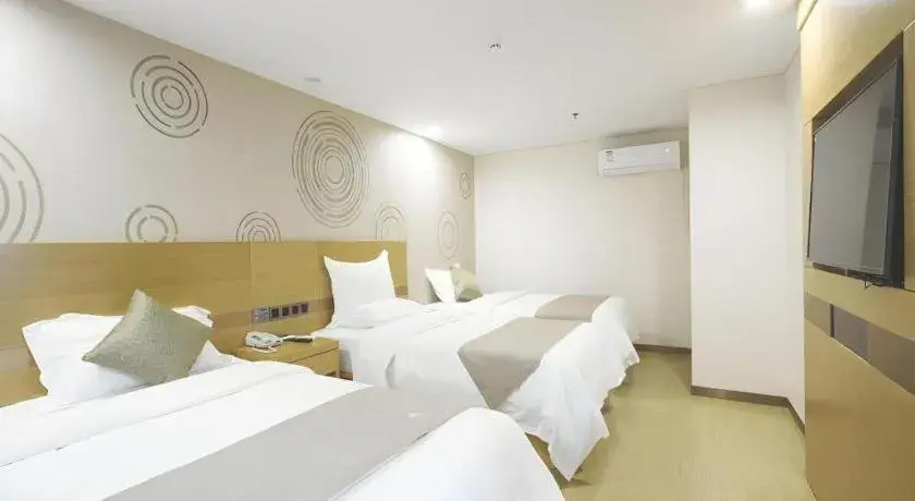 Bed in GreenTree Inn Zhangjiagang Yangshe Old Street Stadium Bed in GreenTree Inn Zhangjiagang Yangshe Old Street Stadium