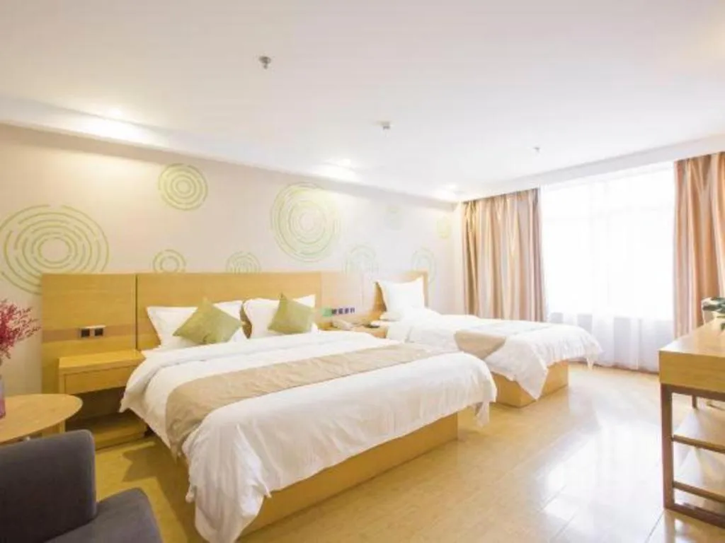 Bed in GreenTree Inn Zhangjiagang Yangshe Old Street Stadium