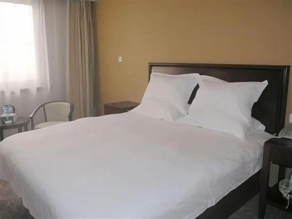 Bed in GreenTree Inn Zhangjiagang Yangshe Old Street Stadium Bed in GreenTree Inn Zhangjiagang Yangshe Old Street Stadium