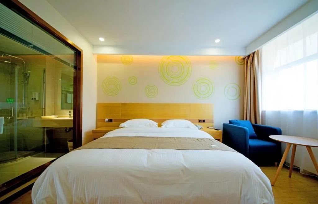 Bed in GreenTree Inn Zhangjiagang Yangshe Old Street Stadium