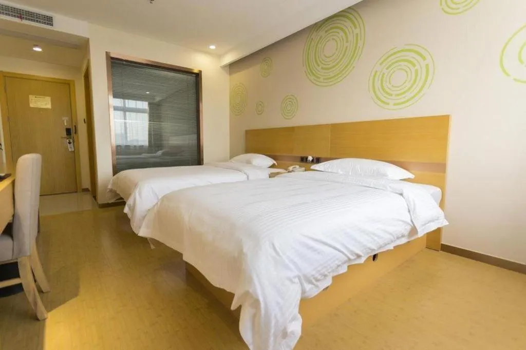 Bed in GreenTree Inn Zhangjiagang Yangshe Old Street Stadium