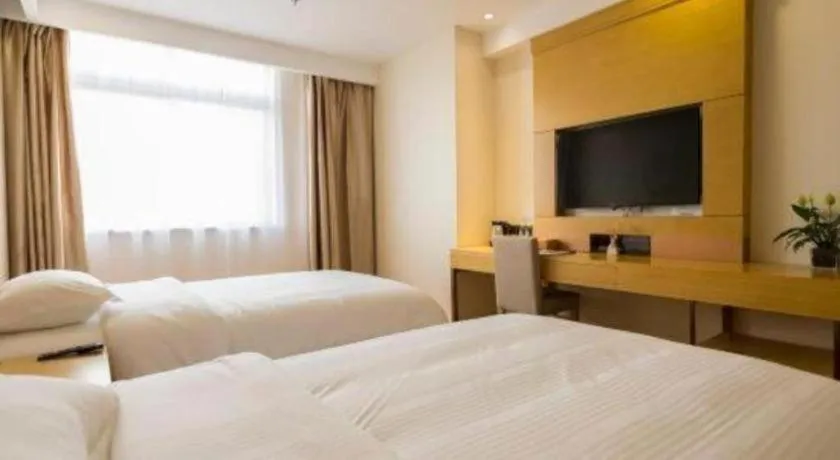 Bed in GreenTree Inn Zhangjiagang Yangshe Old Street Stadium