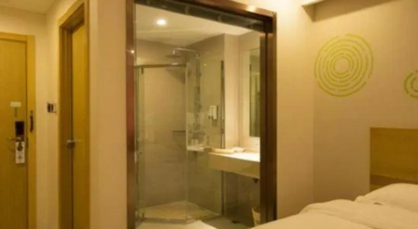 Bed in GreenTree Inn Zhangjiagang Yangshe Old Street Stadium