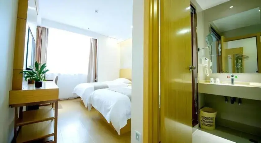 Bed in GreenTree Inn Zhangjiagang Yangshe Old Street Stadium Bed in GreenTree Inn Zhangjiagang Yangshe Old Street Stadium