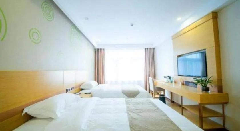 Bed in GreenTree Inn Zhangjiagang Yangshe Old Street Stadium