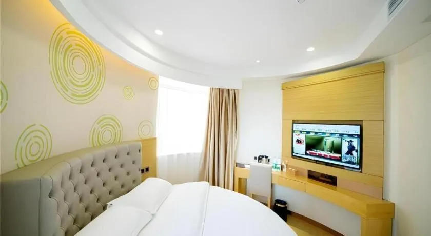 Bed in GreenTree Inn Zhangjiagang Yangshe Old Street Stadium