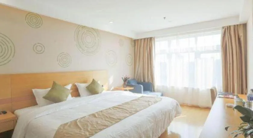 Bed in GreenTree Inn Zhangjiagang Yangshe Old Street Stadium