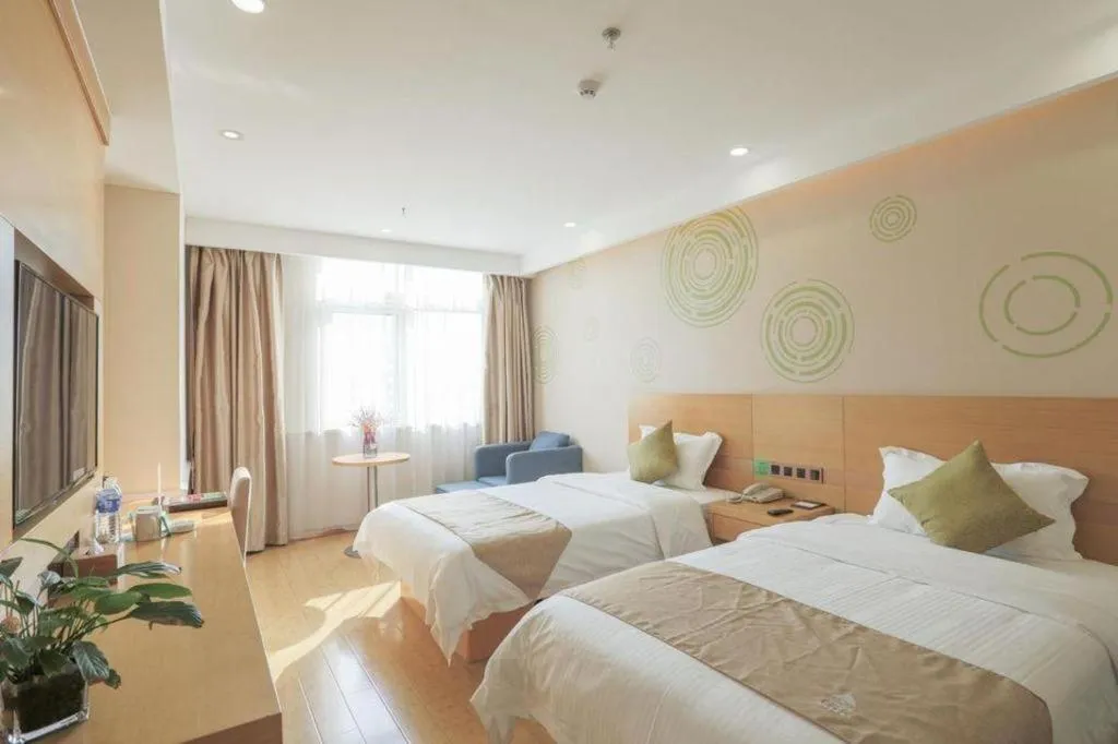Bed in GreenTree Inn Zhangjiagang Yangshe Old Street Stadium