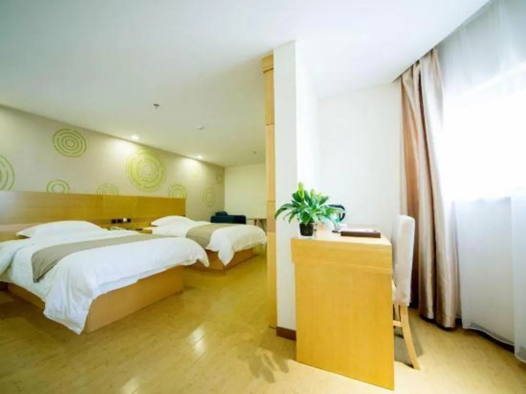 Bed in GreenTree Inn Zhangjiagang Yangshe Old Street Stadium