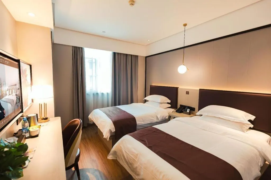 Bed in GYA Shanghai Jiangpu Hotel