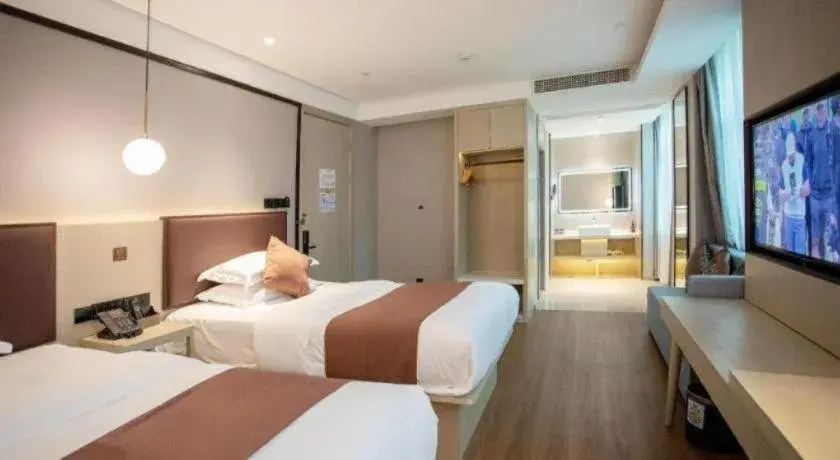 Bed in GYA Shanghai Jiangpu Hotel Bed in GYA Shanghai Jiangpu Hotel