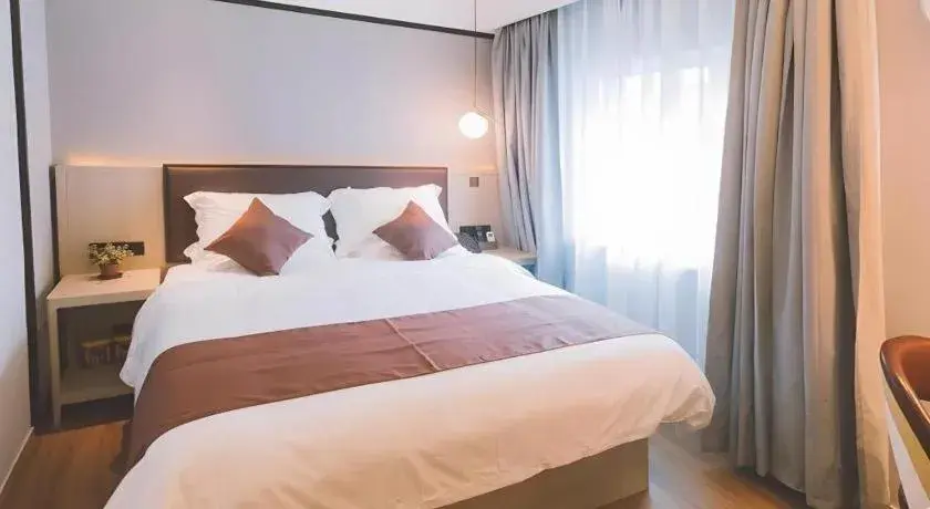 Bed in GYA Shanghai Jiangpu Hotel Bed in GYA Shanghai Jiangpu Hotel