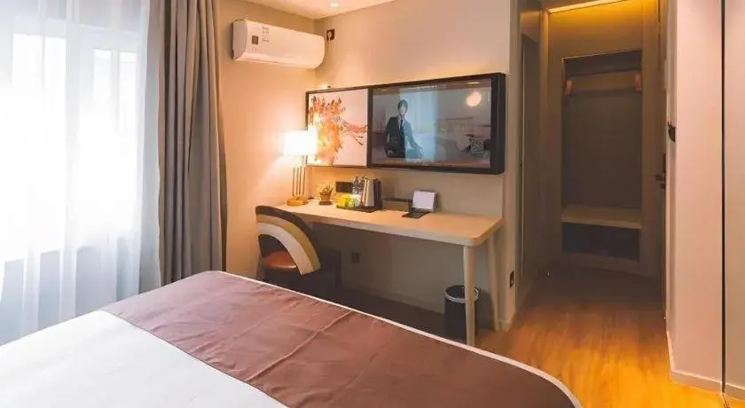 Bed in GYA Shanghai Jiangpu Hotel Bed in GYA Shanghai Jiangpu Hotel