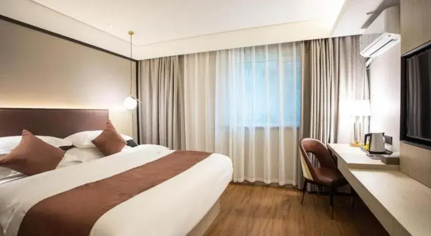 Bed in GYA Shanghai Jiangpu Hotel Bed in GYA Shanghai Jiangpu Hotel