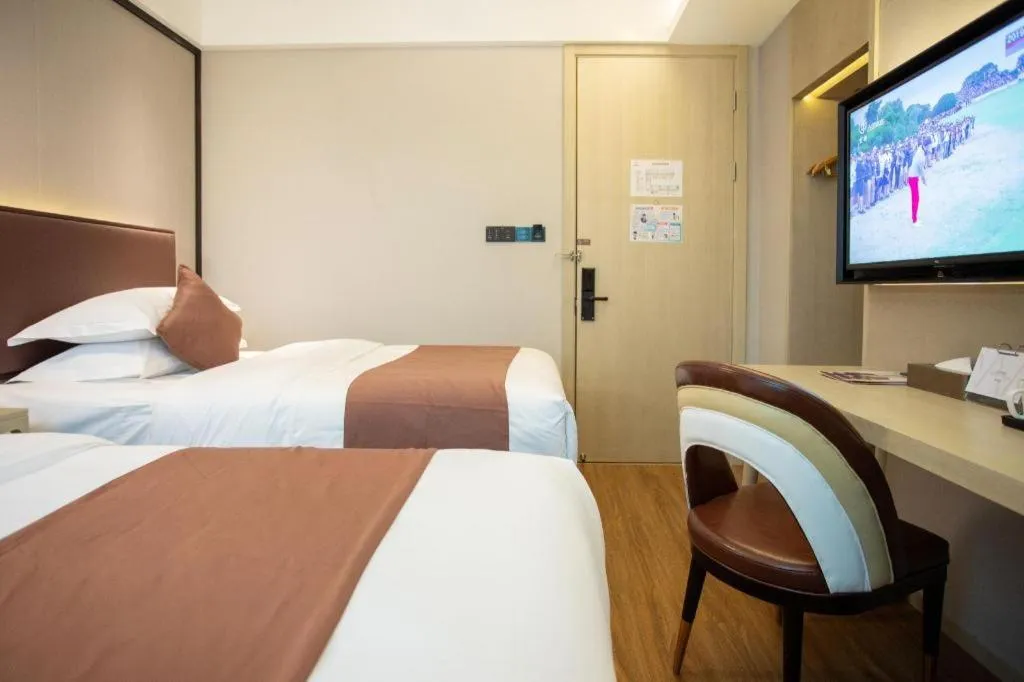 Bed in GYA Shanghai Jiangpu Hotel