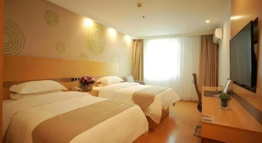 Bed in GreenTree Inn Shanghai National Convention and Exhibition Center Huaxiang Road
