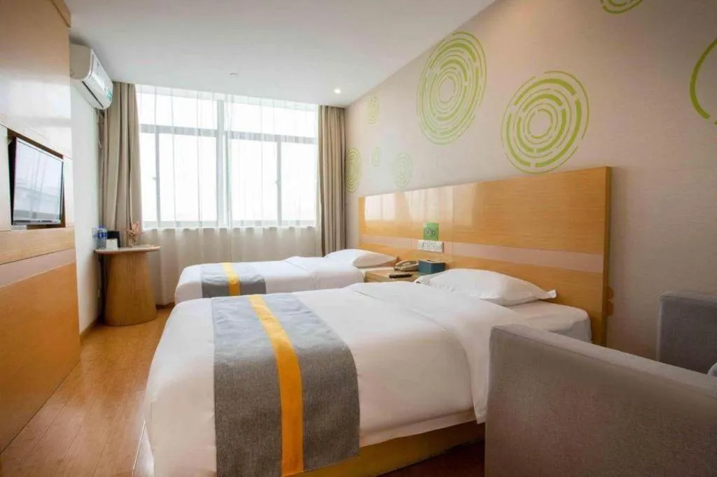 Bed in GreenTree Inn Shanghai National Convention and Exhibition Center Huaxiang Road