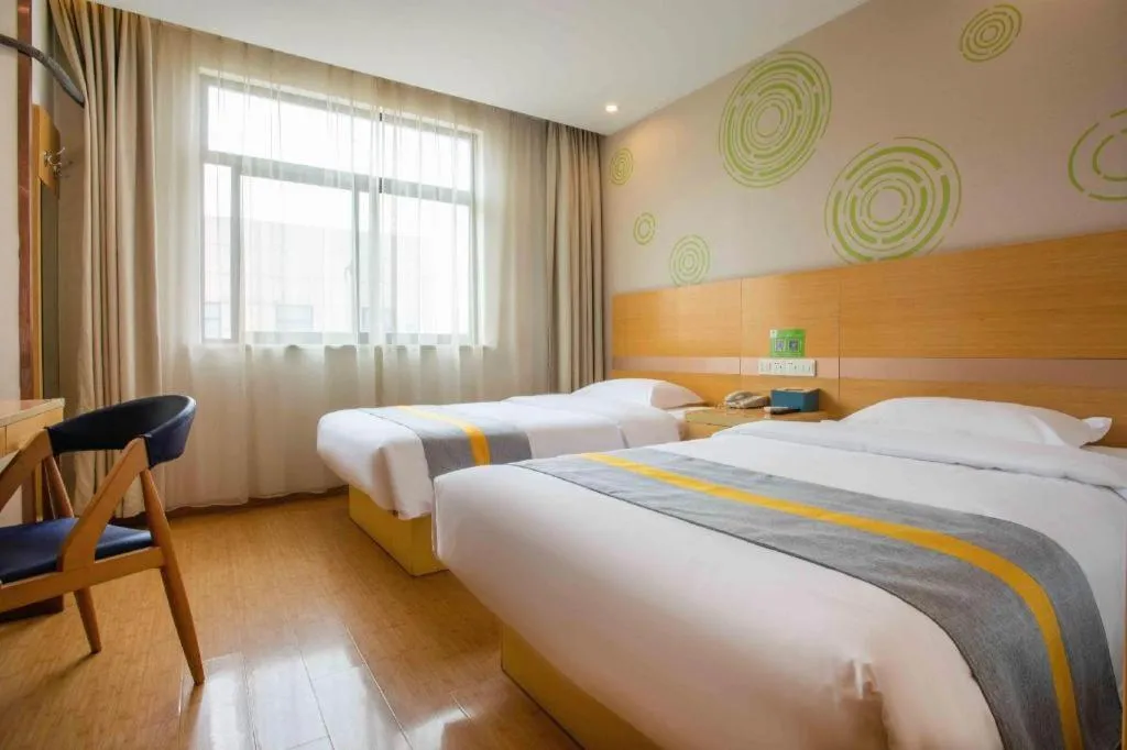 Bed in GreenTree Inn Shanghai National Convention and Exhibition Center Huaxiang Road