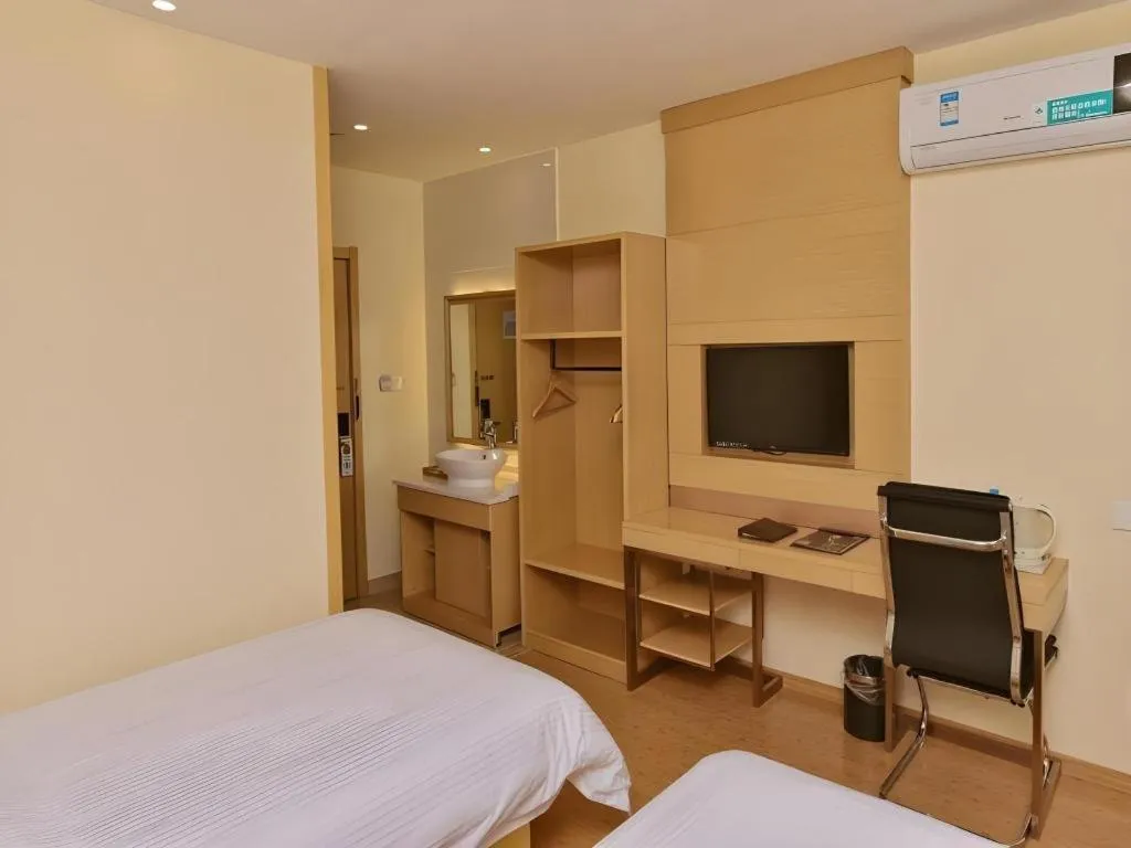 Bed in GreenTree Inn Shanghai National Convention and Exhibition Center Huaxiang Road