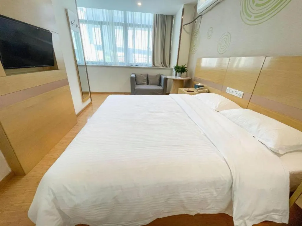 Bed in GreenTree Inn Shanghai National Convention and Exhibition Center Huaxiang Road