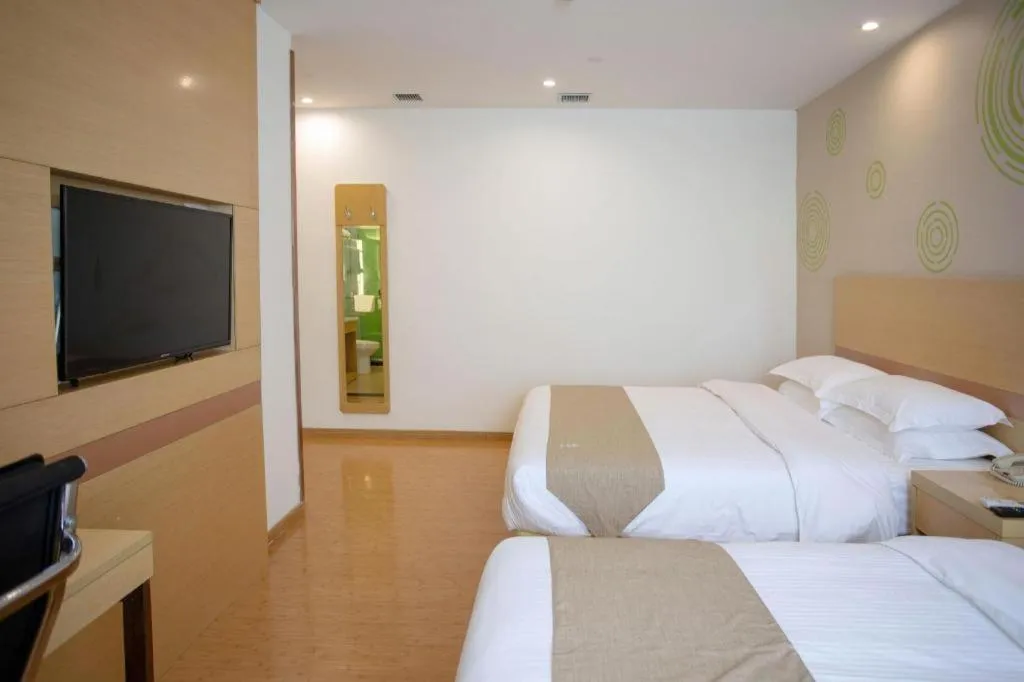 Bed in GreenTree Inn Shanghai National Convention and Exhibition Center Huaxiang Road