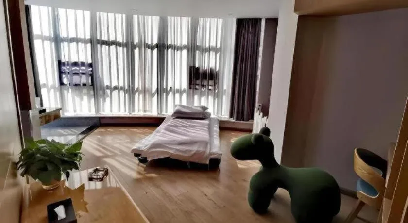 Bed in VX Dali Erhai Park Seascape Hotel